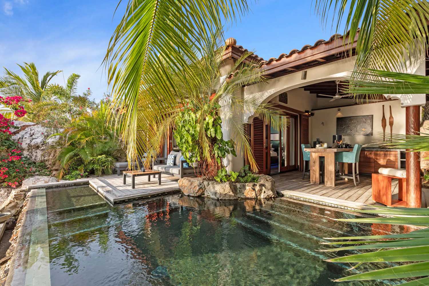 Superior Beachfront Pool Suite LuxuriaVacations
